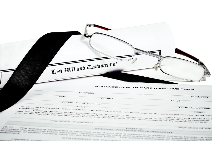 Experienced will lawyers and estate lawyers Adelaide reviewing last will and testament document.